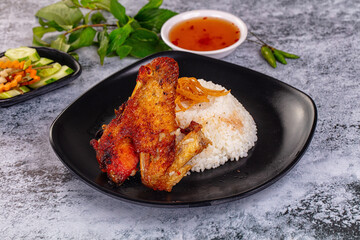 Spicy roasted chicken wing with rice