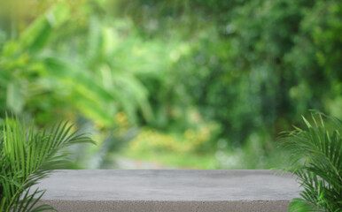 minimal concrete table top podium with outdoors in tropical forest nature background.natural product pedestal modern stand display,jungle paradise concept.