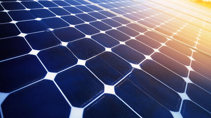 A close-up of a solar panel with sunlight reflecting off the panels.