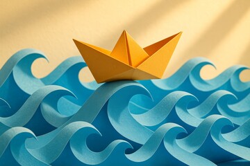 Bright yellow origami boat floating on vibrant blue paper waves during creative art project