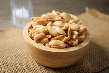 Salted Peanuts in wooden bowl