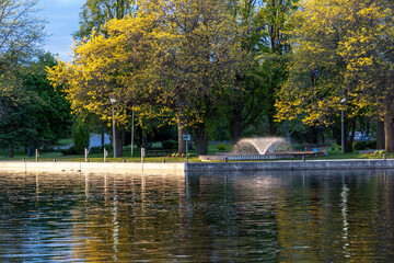 Park with lighted fountains along Rideau River in Smiths Falls town in Ontario, Canada. Centennial Park