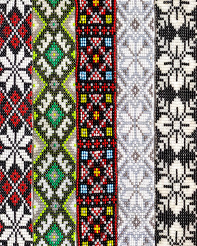 Fototapeta Set of traditional Ukrainian sylianka beaded chokers with ethnic patterns.  handmade necklace created by threading small beads into geometric or floral designs. folk accessory in Ukrainian culture