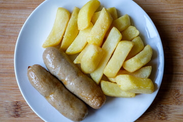 Two Pork Sausages With Chips Meal