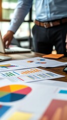 Visual data analysis reveals an engaging workspace, showcasing colorful charts and graphs that reflect strategic planning and informed decision-making processes.