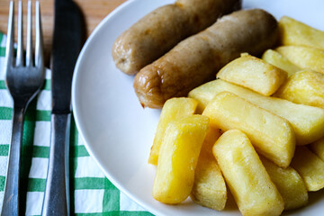 Two Pork Sausages With Chips Meal