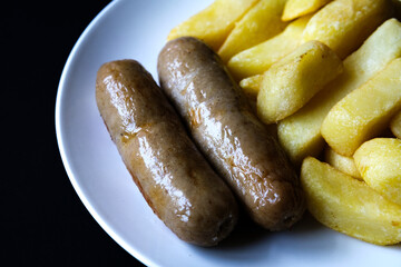 Two Pork Sausages With Chips Meal