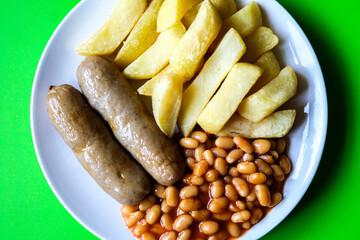 British Favourite Pork Sausages With Chips And Baked Beans In Tomato Sauce