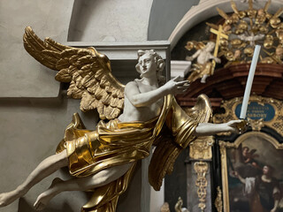 Beautiful angel with golden wings