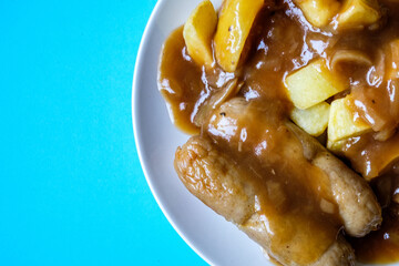 Family Favourite Two Port Sausages And Chips With Thick Tasty Onion Gravy