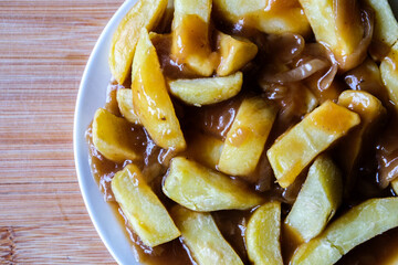 Plate of Wholesome Chips With Onion Gravy