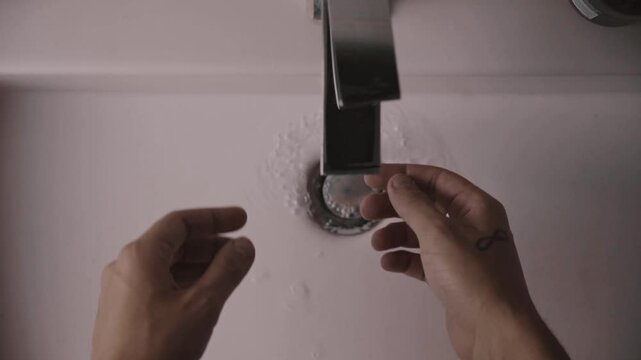 Close-Up of Hands Washing with Soap in Sink &ndash; Slow Motion Hygiene
