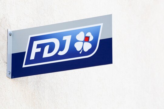 Gleize, France - April 1, 2025: Francaise des Jeux also called FDJ is the operator of national lottery games in France and the title sponsor of the FDJ cycling team	
