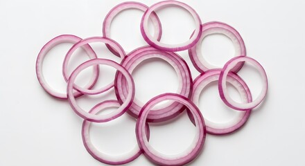 Fototapeta premium Red Onion Slices Arranged in Rings on White Background