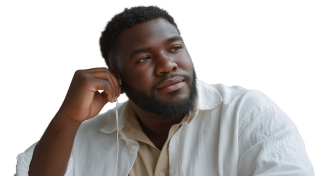 Focused young man listening to music transparent background lifestyle portrait indoor setting relaxed viewpoint