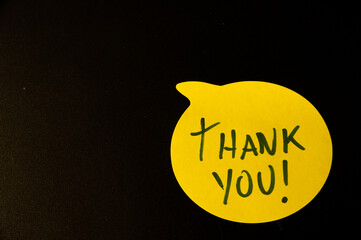 Yellow Emoji with “Thank You” Text on Black Background.