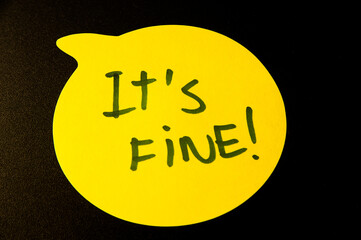 Yellow Emoji with “It´s fine” Text on Black Background