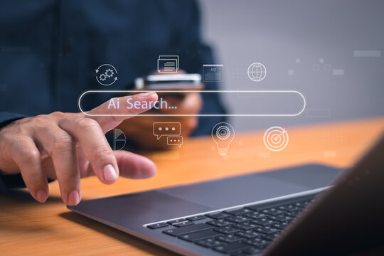 Concept Using AI search for information or search engine optimization ,SEO, Man hand tapping on virtual search bar while using laptop, show search for information with internet technology connection