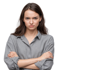 Serious young woman looking angry and frustrated, standing with arms crossed, isolated on transparent background