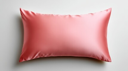 Soft pink pillow on white background, a touch of comfort and style for your bedroom