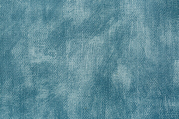 Macro jeans background texture,Closeup, macro of blue jeans denim fabric texture background. Diagonal weaving jean cloth, canvas. Textile for decor, upholstery, garment. Wallpaper, backdrop.