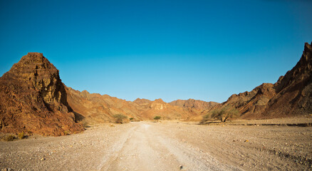 View of rocky landscape in the desert of Israel, sandstone cliffs and desert. Israel. Eilat.