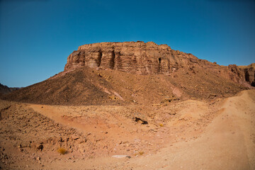 Fototapeta premium Mountains in the desert. Traveling through the desert of Israel. Tourism and travel in Israel. Eilat.