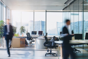 Blur workplace or work space with businessman and businesswoman by the table in office room