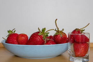 Bowl fill with strawberries.