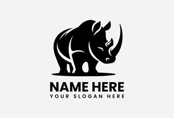Bold black rhinoceros silhouette vector logo with distinctive horn symbolizing raw power and animal preservation
