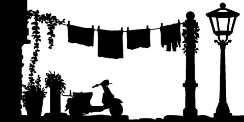 Fototapeta premium Urban serenity with scooter silhouette on a narrow street with hanging laundry