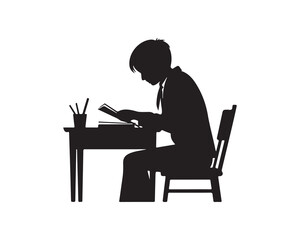 Silhouette of a student studying at a desk