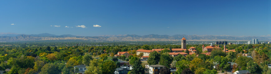 Fototapeta premium Ultra Wide Landscape Panorama View of the old town in the mountains during summer in Denver, CO