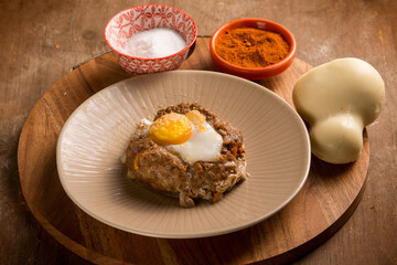 minced meat nest with scamorza cheese and egg