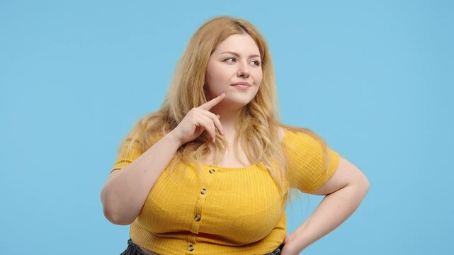 Thoughtful around body positive woman On blue. Puzzled Lady Looking for Answer