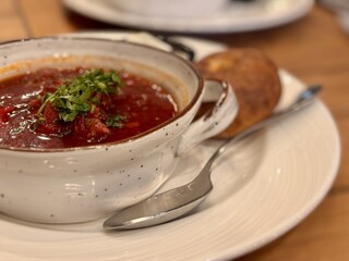 Soup vegetables red borscht on table. First course vegetable dish fresh delicious gourmet food background on the table rustic food vegetarian and vegan food. Close-up