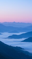Fototapeta premium Serene Sunrise Misty Mountain Landscape Photography