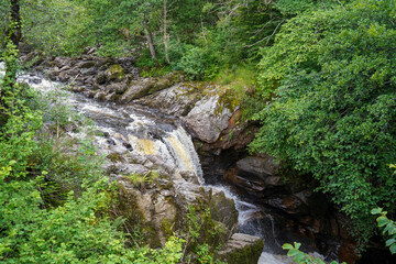 Small river flowing over granite rocks