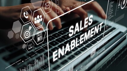 Hands Typing on Laptop with Overlay Graphics on Sales Enablement and Digital Marketing Concepts in...