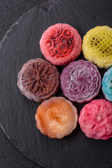 Chinese mooncake is an Asian sweet dessert. Asian mooncake as a background for your design