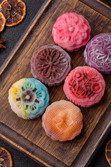 Chinese mooncake is an Asian sweet dessert. Asian mooncake as a background for your design