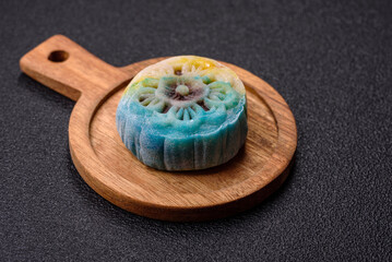 Chinese mooncake is an Asian sweet dessert. Asian mooncake as a background for your design