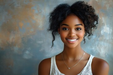 Smiling young African American woman with natural hair showcases joy against a textured background during a casual indoor setting