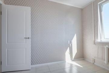 modern door handle on white wooden door in interior. Knob close-up elements. Door handle, fittings for interior design