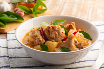 Thai Chicken Red Curry with Winter Melon in white bowl.asian food.