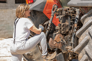Steady hands in the field, rural repair in the sun