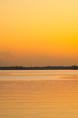 Obraz premium sunset over the river