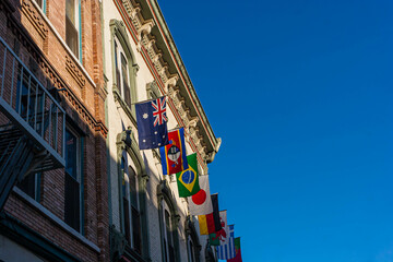 International Flags and  Victorian Style Architecture in The Historic Gaslamp Quarter, San Diego, California, USA