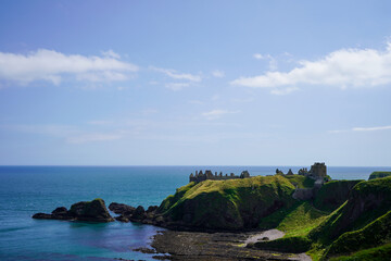 View of rocky cliff edge and sea in Scotland in the summer