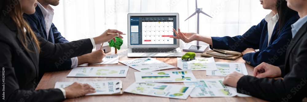Poster calendar on computer software application for brisk schedule planning for personal organizer and onl